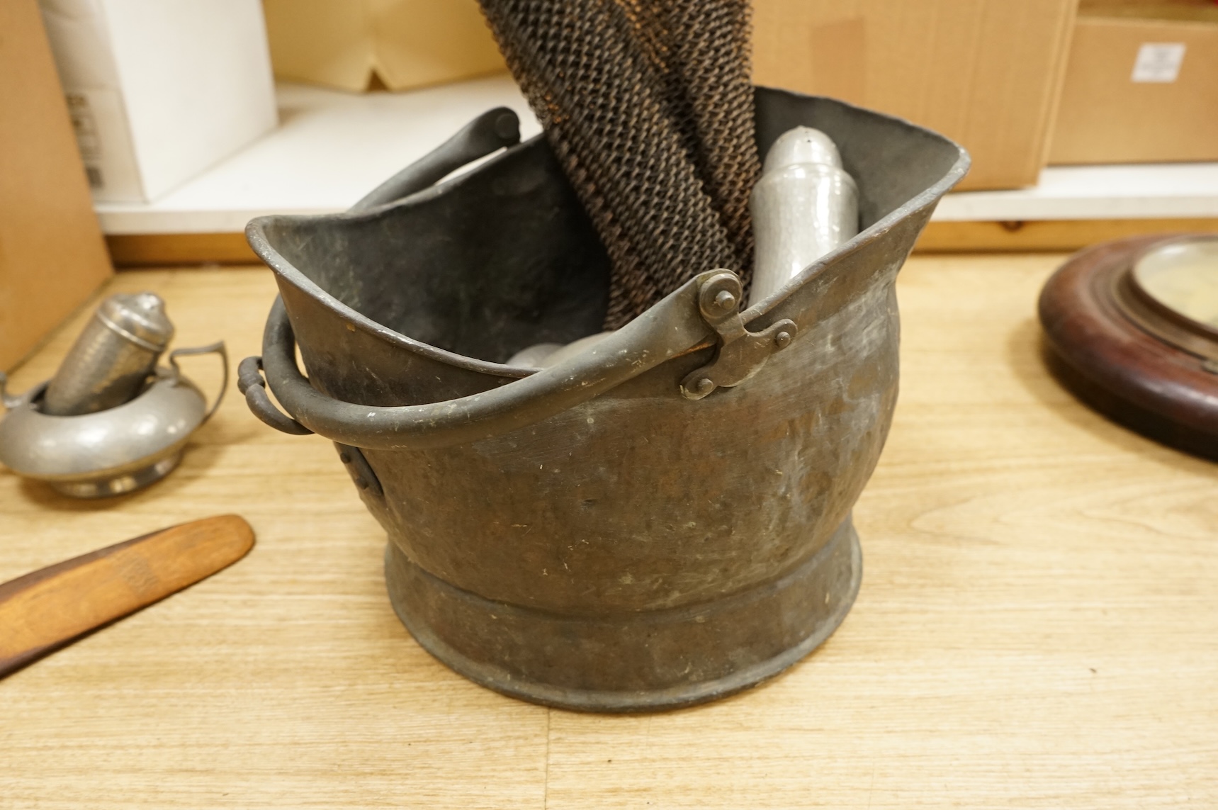 A Hutton, Sheffield English Pewter tea set comprising a teapot, 8cm high, jug and sugar bowl, together with salt and pepper shakers by other makers, a copper coal scuttle and two American mesh fire screens, coal scuttle